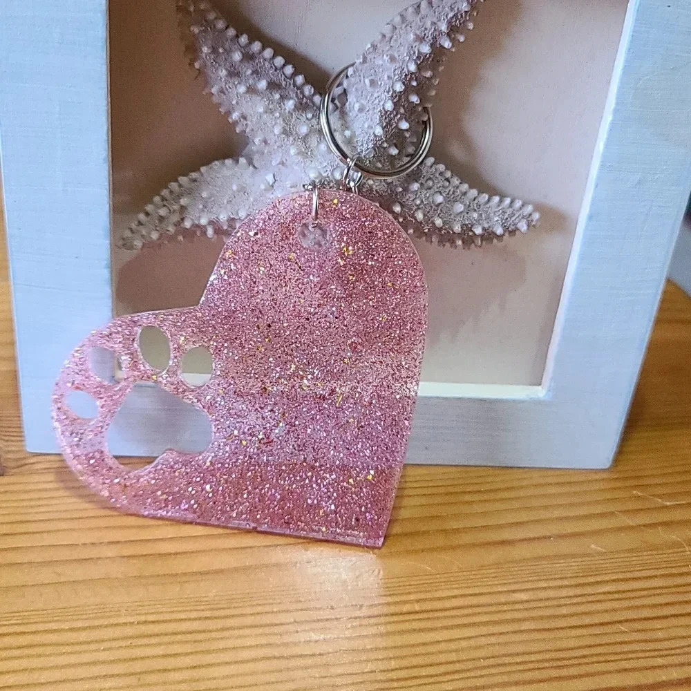 Heart with paw print resin keychain